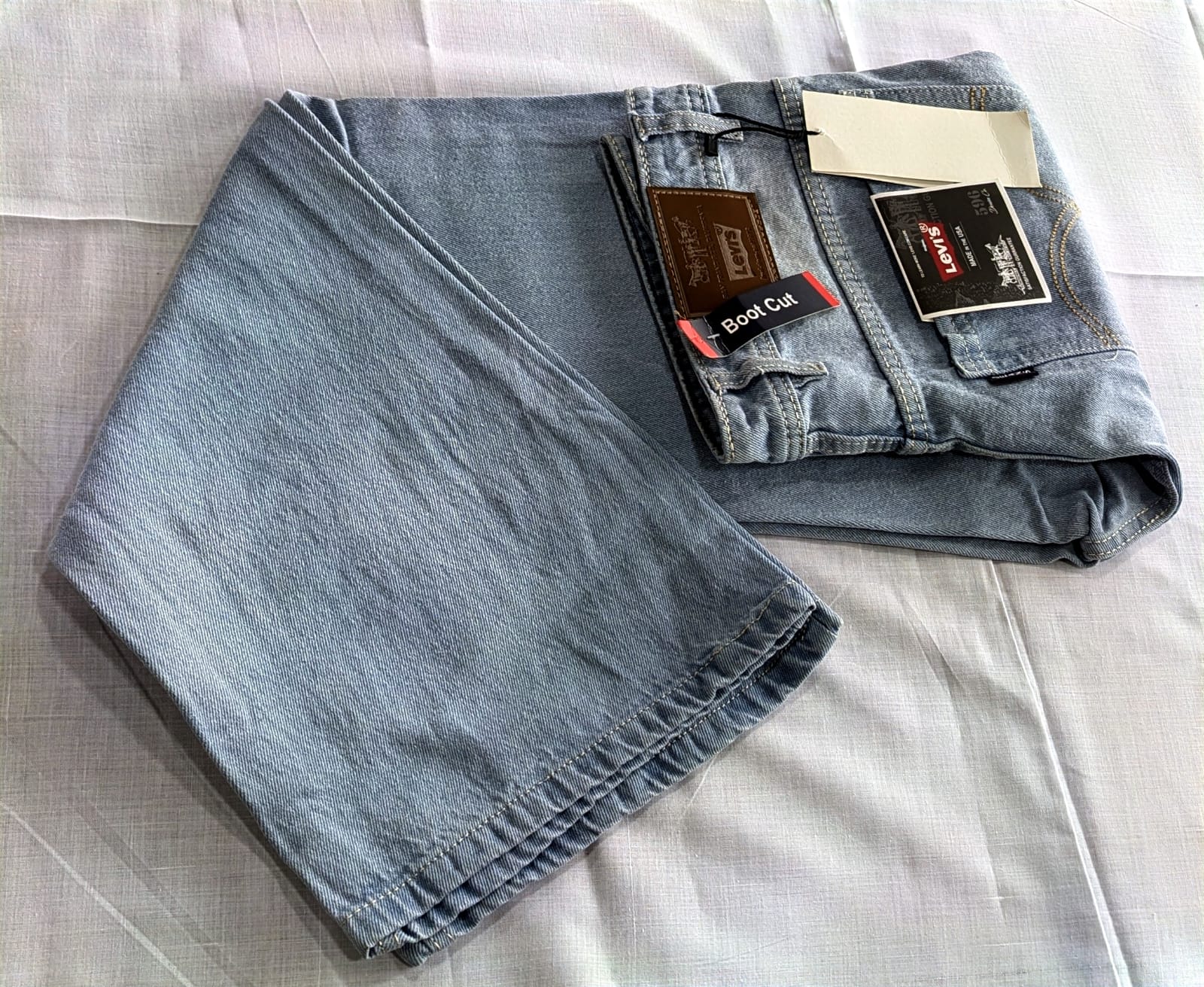 Jeans light blue color  boot cut style